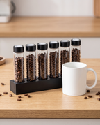 Bottega Bean Curator next to a coffee mug, size reference