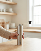 Grinding beans with the Precision manual grinder